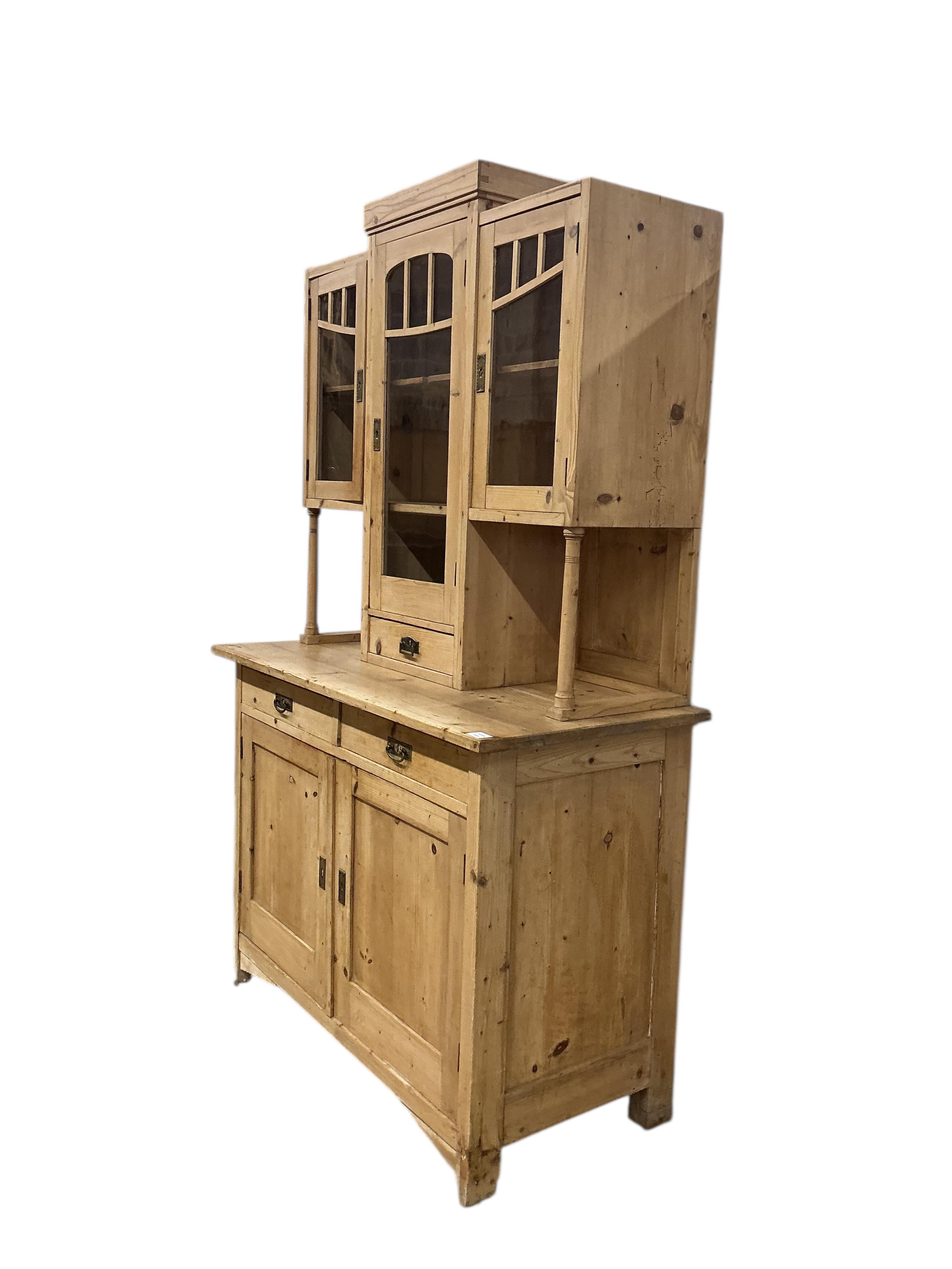 A 19th century East European pine dresser, width 120cm, depth 58cm, height 196cm